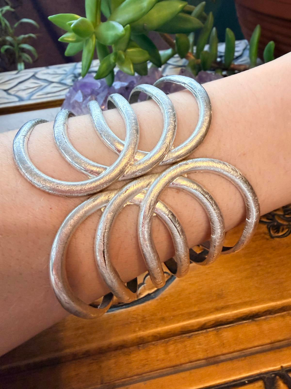 Vintage cuff bracelet bangle Silver Tone metal curved band spring hinge clasp