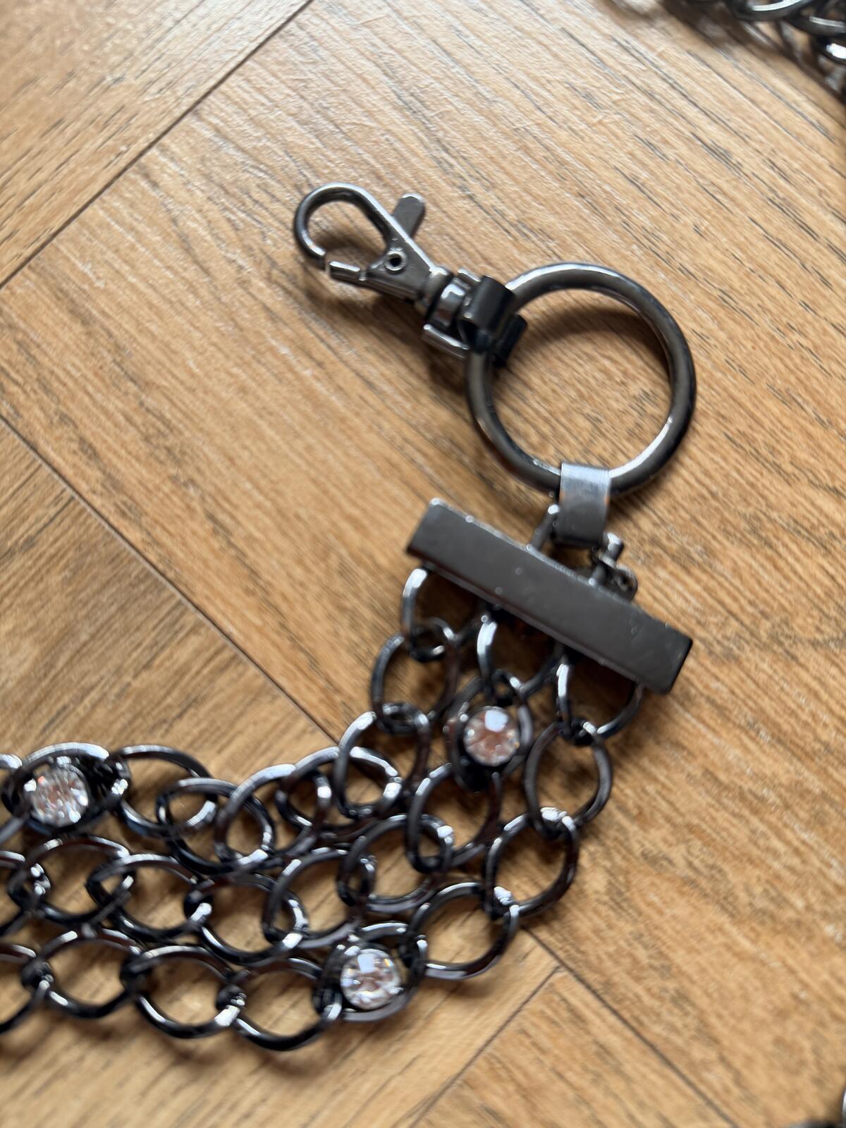 Black Multi Chain Metal Belt with Rhinestone Detailing and Tassel Accent